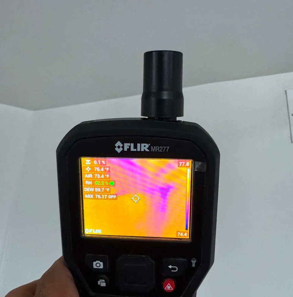 Thermal imaging camera reading used to map hidden moisture on a Revive Pro Solutions job